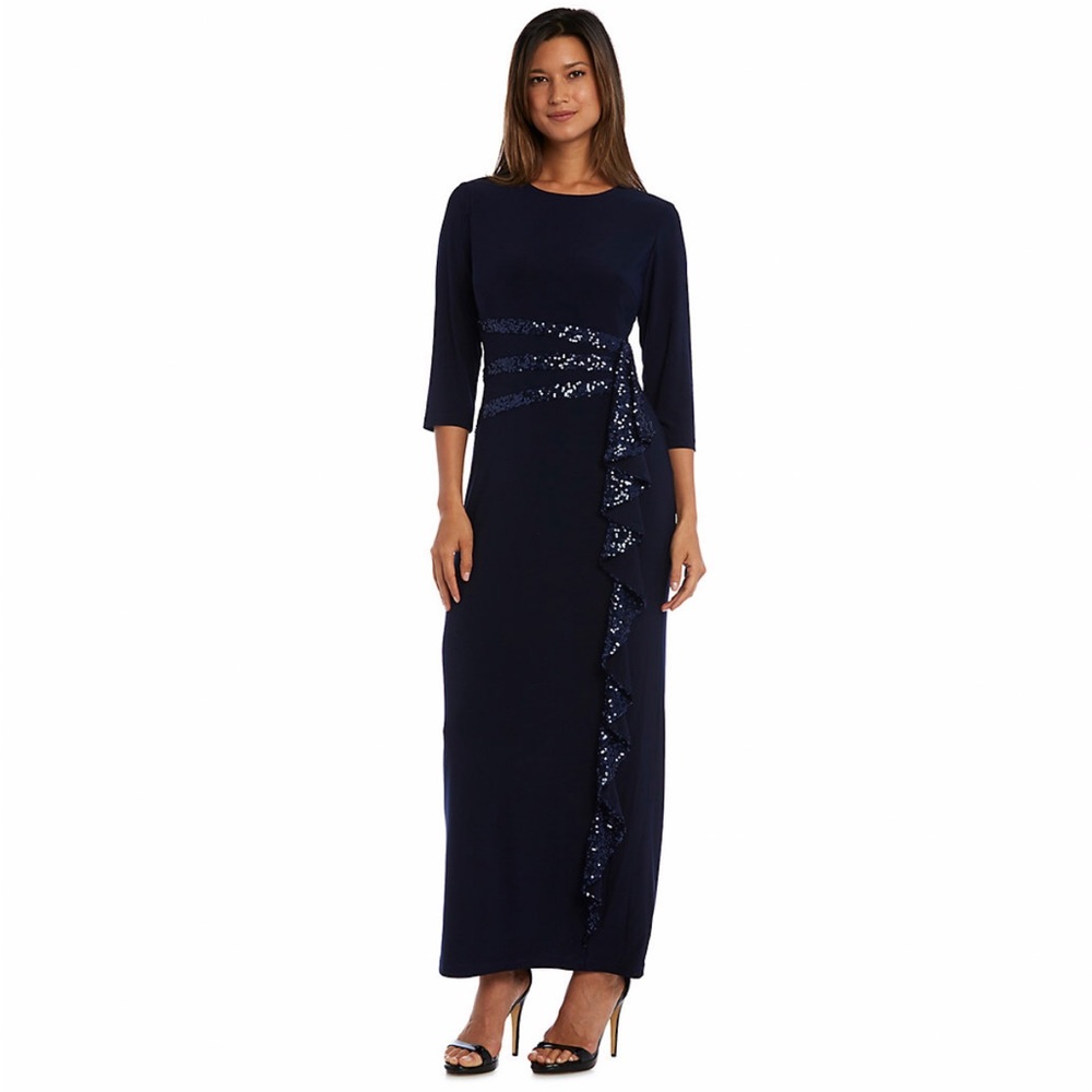 Beautiful blk evening cocktail dress.  I have a size 10P and 15P, zippered back